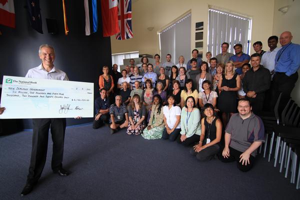 CEO John Fabrin with $6M cheque and some of the RBG team